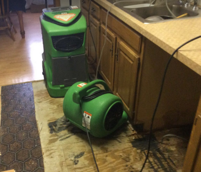 equipment set up after water damage in kitchen